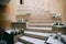 Rustic wedding decor, decorated stairs white candles and fresh flowers