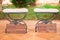 Rustic wedding decoration. Stools for bride and groom.