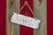 Rustic welcome sign with skeleton key