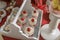 Rustic white wooden tray with small size glass pastry desserts and cupcakes