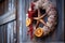 Rustic Winter Wreath on Gray Barn Door