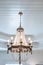 rustic wood and beaded hanging beach or coastal themed chandelier in a living room