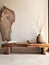 Rustic wood slab on tree stumps. Wooden bench near stucco empty wall with copy space. Boho interior design of modern room