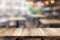 Rustic Wood Table in Cafe Setting for Your Photography Needs.