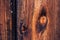 Rustic wooden background texture: Knothole