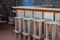 Rustic wooden bar and stools on empty patio