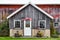 Rustic Wooden Barn with USA Flag Flying in Wind