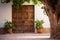 rustic wooden door of a spanish revival home