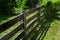 Rustic Wooden Fence and Raspberry Vines