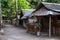 Rustic wooden huts street asian village. Native lifestyle travel photo. Traditional lifestyle of fishermen on sea shore