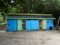 Rustic wooden public restroom on an island