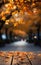 A rustic wooden table against a radiant autumn maple tree bokeh backdrop