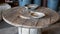 Rustic, wooden table with rusty metal pans on it