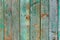 Rustic wooden wall. Old painted planks in green color. Retro style background