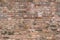 Rustic worn brick wall pattern as background