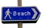 Rusting Beach Direction Sign at a Coastal Location