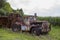 Rusting farm truck in field