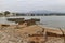 The Rusting Remains of old Iron ships lie abandoned on a beach along Ana Chaves Bay on Sao Tome Island.