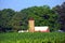 Rusting Roofed Silo and Red Barn