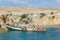 Rusting ship wreck stranded at beach of Angola`s Namib coast