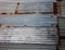 Rusting weathered corrugated iron wall ideal as industrial background