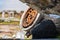 Rusty aircraft wheel and damaged tyre at plane crash site