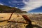 Rusty Anchor in the Rocks on the Sea Shore