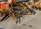 Rusty anchors and styrofoam buoys beside guardrail in parking lot