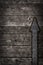 Rusty arrow on wooden background