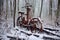 rusty bike frame swallowed by snow in forest clearing