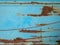 Rusty blue painted detailed metal texture background.