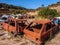 Rusty body cars in a junkyard on a sunny day