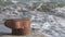 Rusty bollard on pier