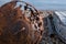 Rusty buoy on the beach at Polbain, north of Ullapool, on the west coast of Scotland.