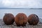 Rusty buoys on the beach at Polbain, north of Ullapool, on the west coast of Scotland.