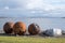 Rusty buoys on the beach at Polbain, north of Ullapool, on the west coast of Scotland.