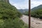 rusty cable, river and mountain in the background, vegetation barranca huentitan, guadalajara