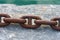 Rusty Chain on a Pier