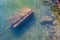 Rusty chain under water, anchor. moor on the shore