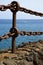 Rusty chain water boat yacht coastline and summer in lanzarote