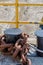 Rusty chain wrapped around ships mooring post