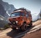 rusty dirt offroad 4x4 lifted vintage custom camper conversion jeep overlanding in mountain roads