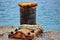 Rusty dock bollard