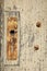 Rusty door mounting on wood