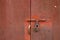 Rusty door with padlock