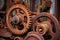 rusty gears and cogs from antique farm machinery