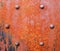 Rusty girder with bolts