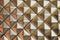 Rusty golden diamonts pattern. Plastic background