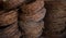 The rusty hanks of an old barbed wire lying in military warehouses.