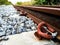 Rusty inactive railroad with concrete sleepers and rocks foundation